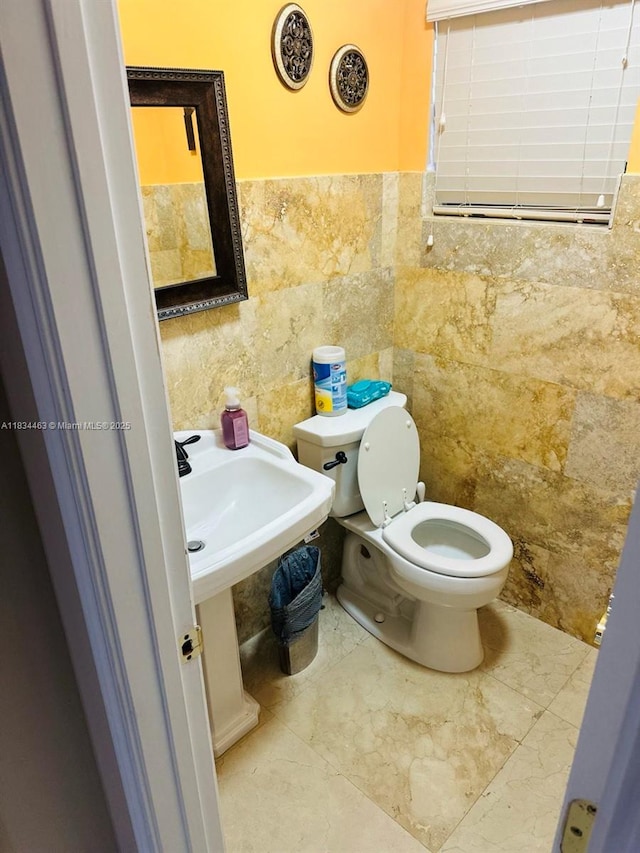 8565 NW 168th Ter, Miami Lakes, FL 33016 - bathroom with tile walls and wainscoting