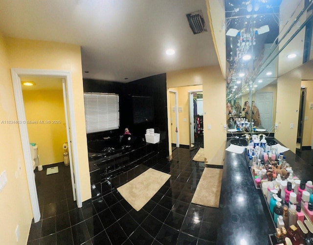 8565 NW 168th Ter, Miami Lakes, FL 33016 - full bath with tile patterned flooring, recessed lighting, a tub, and vanity