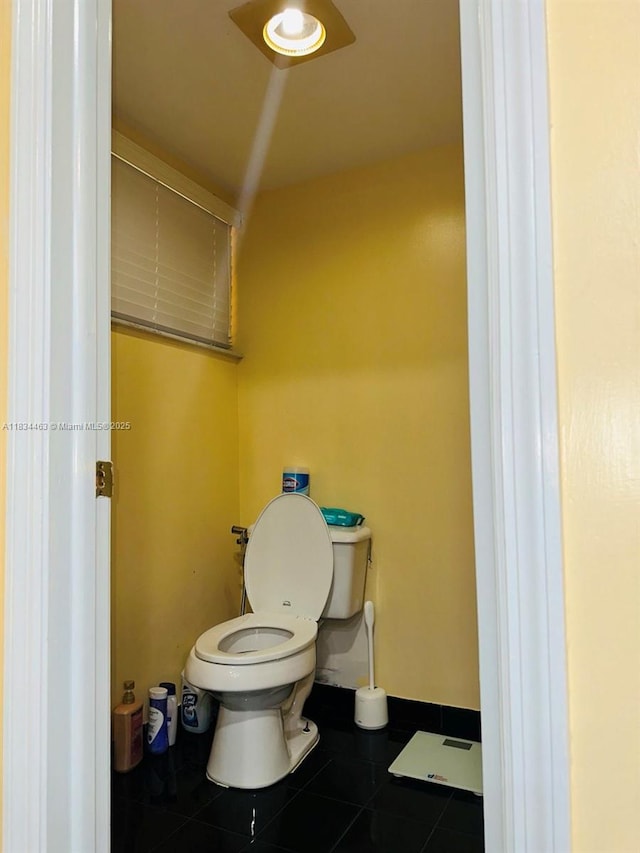 8565 NW 168th Ter, Miami Lakes, FL 33016 - bathroom with toilet and tile patterned floors