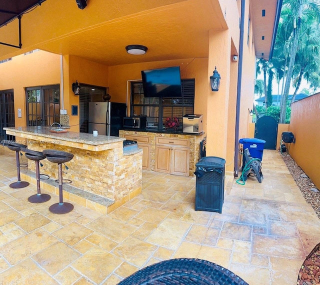8565 NW 168th Ter, Miami Lakes, FL 33016 - view of patio / terrace with exterior kitchen