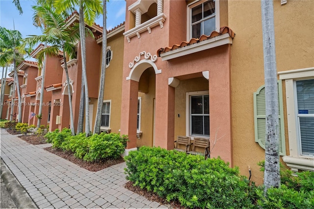 604 SW 107th Ave Unit 706, Pembroke Pines, FL 33025 - entrance to property with stucco siding and a tiled roof