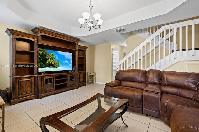 604 SW 107th Ave Unit 706, Pembroke Pines, FL 33025 - living area featuring light tile patterned floors, stairway, a chandelier, and a raised ceiling