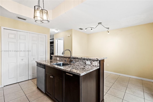 604 SW 107th Ave Unit 706, Pembroke Pines, FL 33025 - kitchen featuring stainless steel dishwasher, light tile patterned floors, hanging light fixtures, light stone counters, and dark brown cabinets
