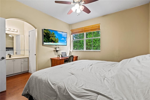604 SW 107th Ave Unit 706, Pembroke Pines, FL 33025 - bedroom featuring wood finished floors, a ceiling fan, and ensuite bathroom