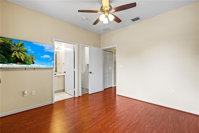 604 SW 107th Ave Unit 706, Pembroke Pines, FL 33025 - unfurnished bedroom with wood finished floors, ceiling fan, and ensuite bathroom