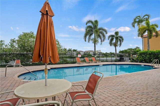 604 SW 107th Ave Unit 706, Pembroke Pines, FL 33025 - community pool featuring a patio