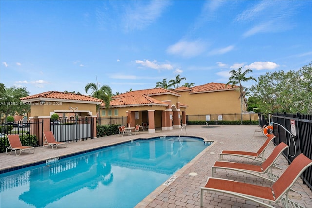 604 SW 107th Ave Unit 706, Pembroke Pines, FL 33025 - community pool featuring a patio area