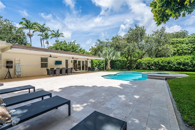 10821 SW 92nd Ave, Miami, FL 33176 - outdoor pool featuring a ceiling fan, a patio, and an in-ground hot tub