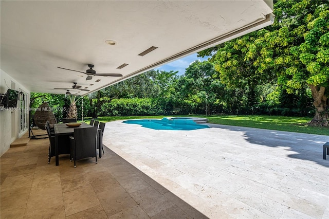 10821 SW 92nd Ave, Miami, FL 33176 - outdoor pool featuring a ceiling fan, a patio, a yard, outdoor dining space, and a jacuzzi