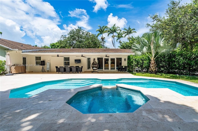 10821 SW 92nd Ave, Miami, FL 33176 - view of swimming pool with a ceiling fan, a patio area, french doors, and a pool with connected hot tub