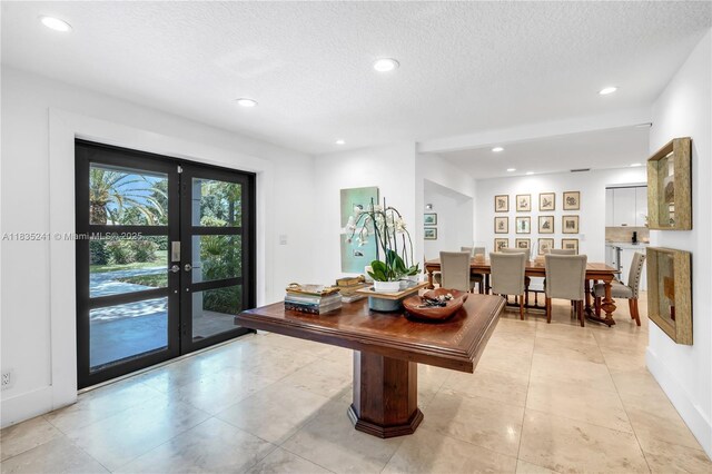10821 SW 92nd Ave, Miami, FL 33176 - dining room featuring a textured ceiling, recessed lighting, french doors, and light tile patterned floors