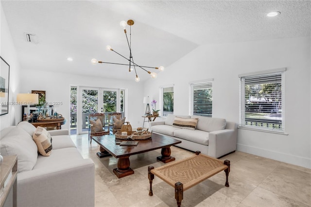 10821 SW 92nd Ave, Miami, FL 33176 - living area with plenty of natural light, a chandelier, vaulted ceiling, a textured ceiling, and recessed lighting