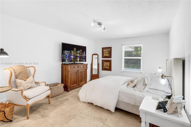 10821 SW 92nd Ave, Miami, FL 33176 - bedroom featuring a textured ceiling and light tile patterned floors