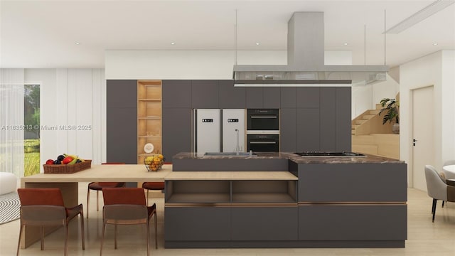 531 Stonemont Dr, Weston, FL 33326 - kitchen featuring modern cabinets, island range hood, gas cooktop, freestanding refrigerator, and dark stone countertops
