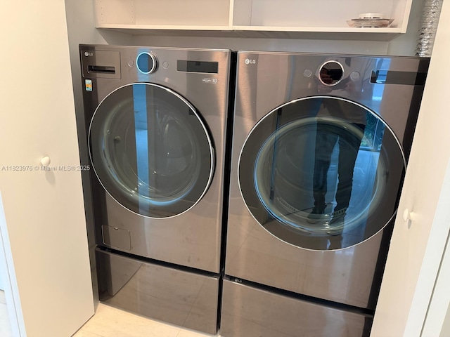 16385 Biscayne Blvd Unit 301, North Miami Beach, FL 33160 - washroom with washer and dryer