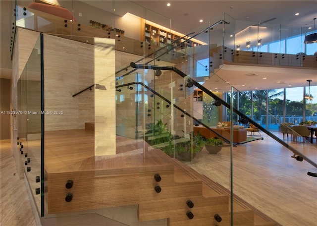 16385 Biscayne Blvd Unit 301, North Miami Beach, FL 33160 - stairs with expansive windows and recessed lighting