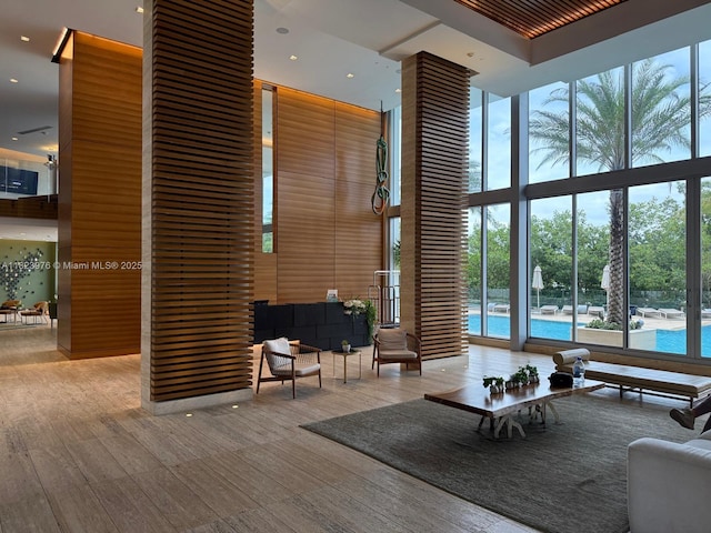 16385 Biscayne Blvd Unit 301, North Miami Beach, FL 33160 - lobby with a high ceiling, floor to ceiling windows, and recessed lighting