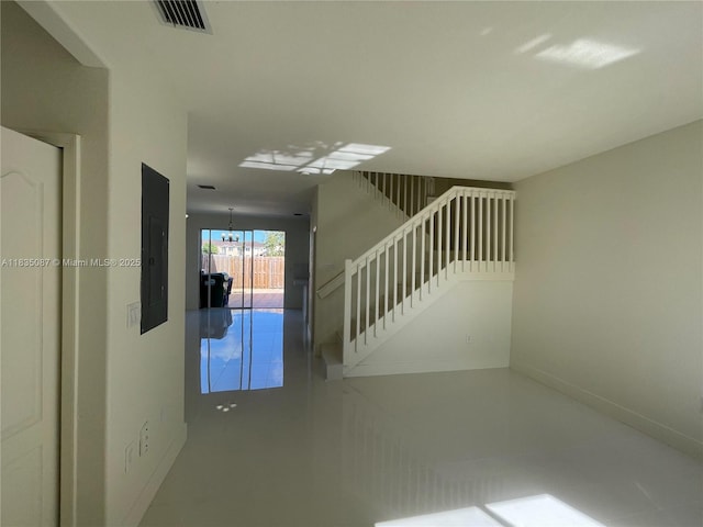 7317 NW 174th Ter Unit 102, Hialeah, FL 33015 - stairway featuring baseboards and electric panel