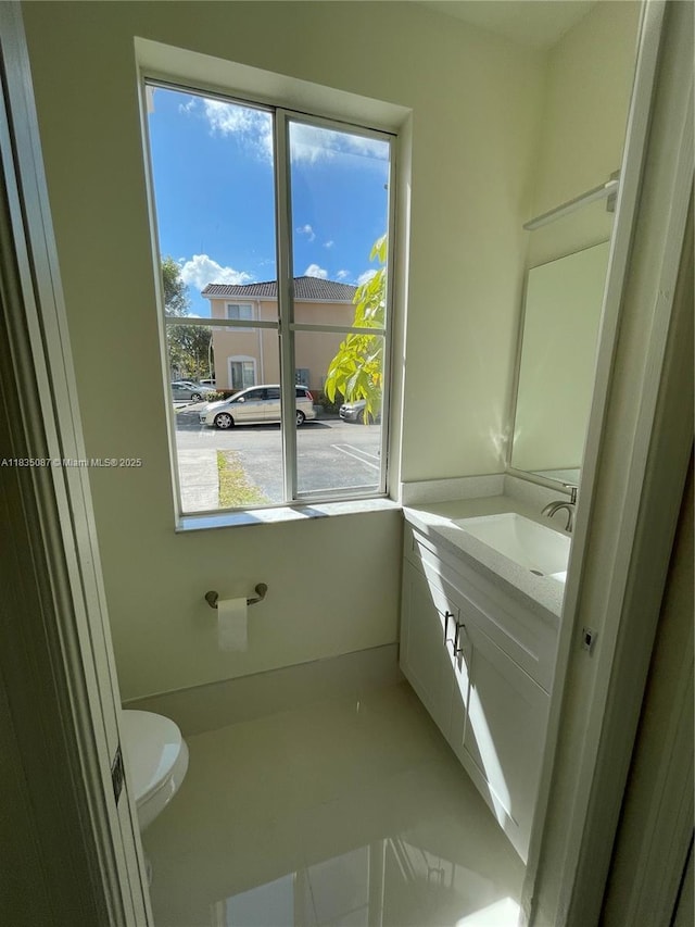 7317 NW 174th Ter Unit 102, Hialeah, FL 33015 - bathroom with vanity and tile patterned flooring