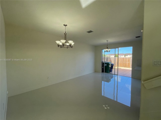 7317 NW 174th Ter Unit 102, Hialeah, FL 33015 - empty room featuring a chandelier and tile patterned floors