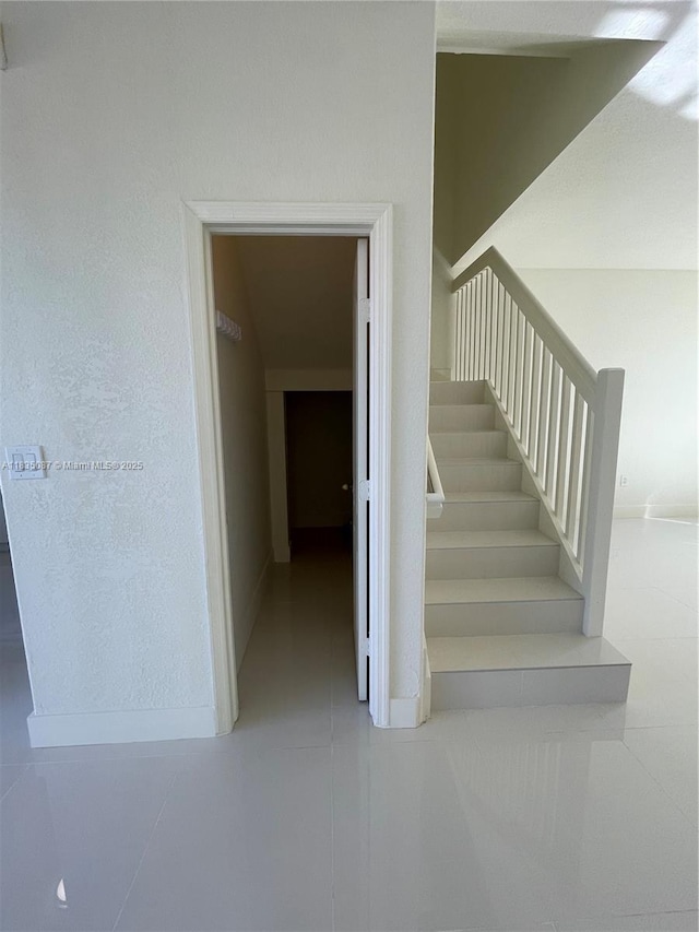 7317 NW 174th Ter Unit 102, Hialeah, FL 33015 - stairs with baseboards