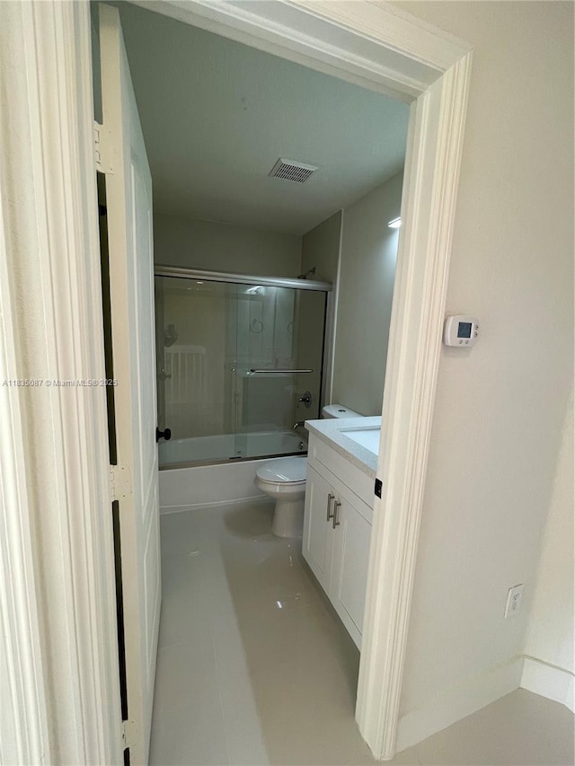 7317 NW 174th Ter Unit 102, Hialeah, FL 33015 - bathroom featuring vanity and shower / bath combination with glass door