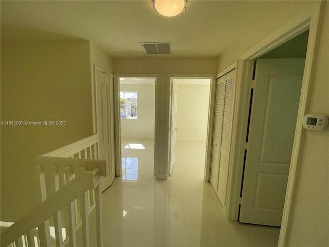 7317 NW 174th Ter Unit 102, Hialeah, FL 33015 - hallway with tile patterned floors