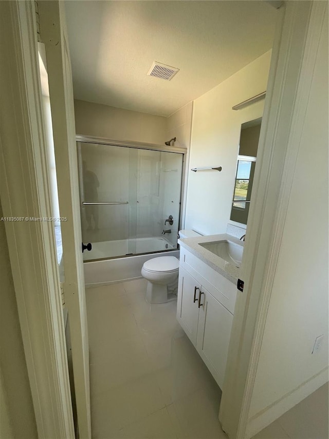 7317 NW 174th Ter Unit 102, Hialeah, FL 33015 - bathroom with vanity and enclosed tub / shower combo