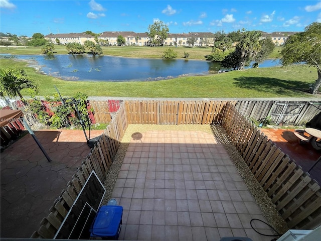 7317 NW 174th Ter Unit 102, Hialeah, FL 33015 - fenced backyard with a water view and a patio