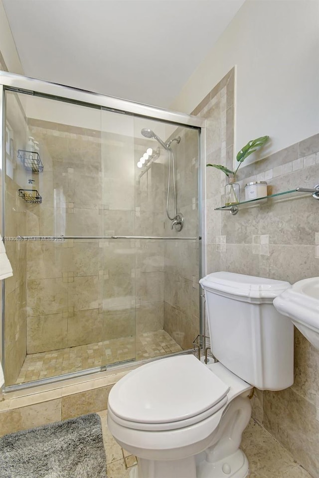 880 SW 64th Ter, North Lauderdale, FL 33068 - bathroom featuring tile walls and a stall shower