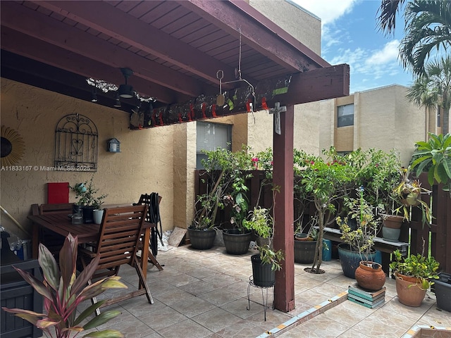 311 W Park Dr Unit 101-13, Miami, FL 33172 - view of patio / terrace with a ceiling fan and outdoor dining space