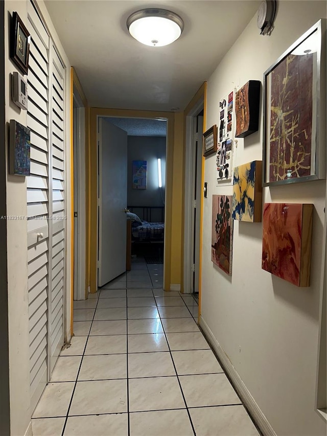 311 W Park Dr Unit 101-13, Miami, FL 33172 - hallway featuring light tile patterned flooring