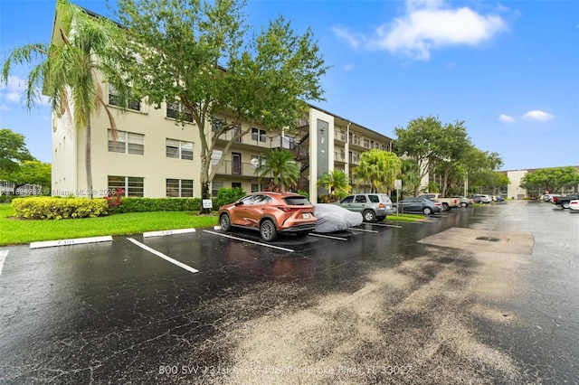800 SW 131st Ave Unit 406F, Pembroke Pines, FL 33027 - view of uncovered parking lot