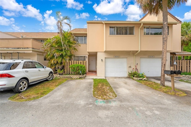 8256 NW 9th Ct Unit 2, Plantation, FL 33324 - multi unit property with an attached garage, stucco siding, and driveway