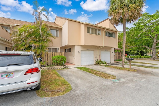8256 NW 9th Ct Unit 2, Plantation, FL 33324 - multi unit property with driveway, stucco siding, and an attached garage