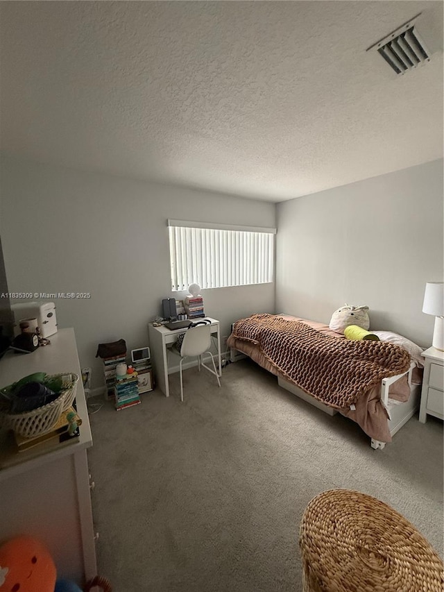 17048 NW 66th Ct, Miami Lakes, FL 33015 - bedroom with carpet flooring and a textured ceiling