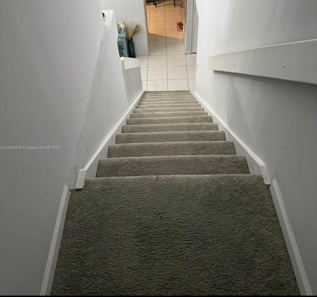 17048 NW 66th Ct, Miami Lakes, FL 33015 - stairway featuring tile patterned flooring and carpet flooring