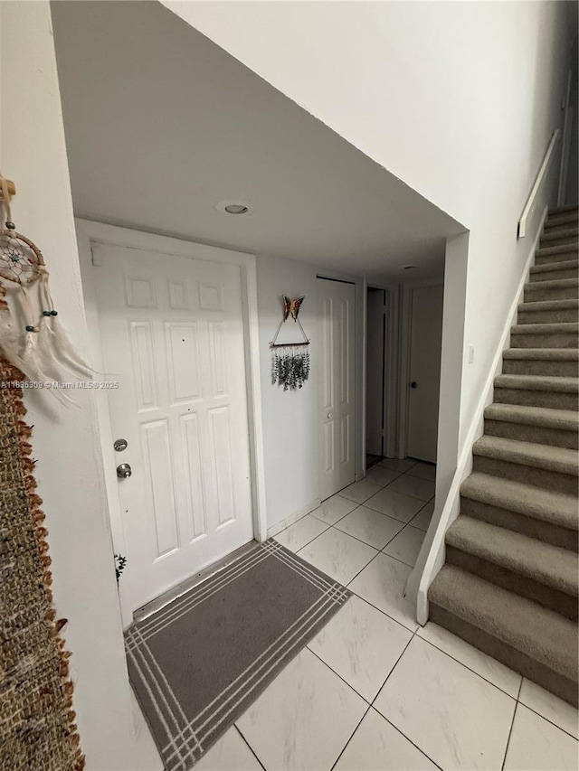 17048 NW 66th Ct, Miami Lakes, FL 33015 - foyer entrance with light marble finish floors and stairs