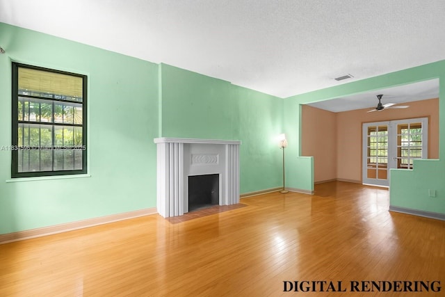 2025 SW 19th St, Miami, FL 33145 - unfurnished living room featuring a fireplace with flush hearth, ceiling fan, and wood finished floors