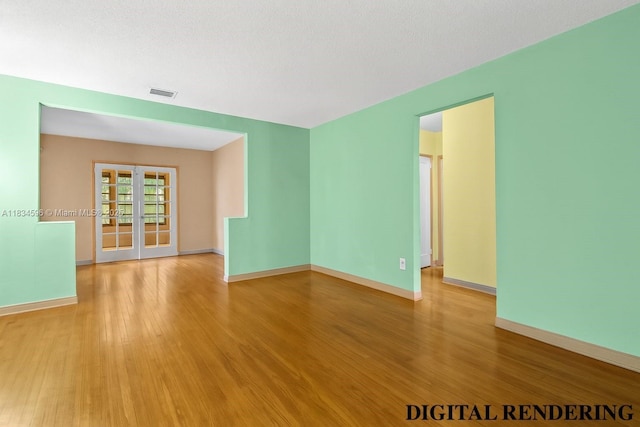 2025 SW 19th St, Miami, FL 33145 - empty room with light wood-style floors and french doors