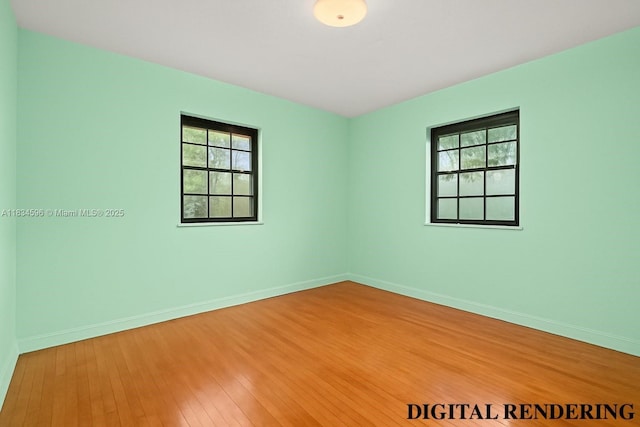 2025 SW 19th St, Miami, FL 33145 - spare room featuring plenty of natural light and wood finished floors