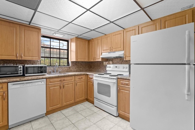 2025 SW 19th St, Miami, FL 33145 - kitchen with white appliances, under cabinet range hood, decorative backsplash, and a paneled ceiling
