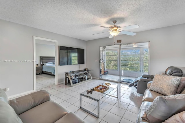 1300 SW 125th Ave Unit 406K, Pembroke Pines, FL 33027 - tiled living area with a ceiling fan and a textured ceiling