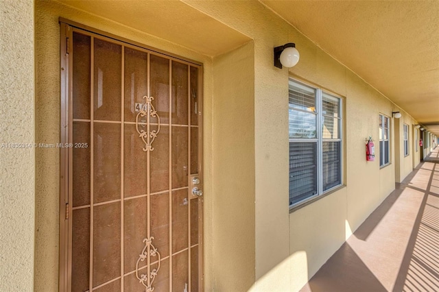 1300 SW 125th Ave Unit 406K, Pembroke Pines, FL 33027 - doorway to property featuring stucco siding