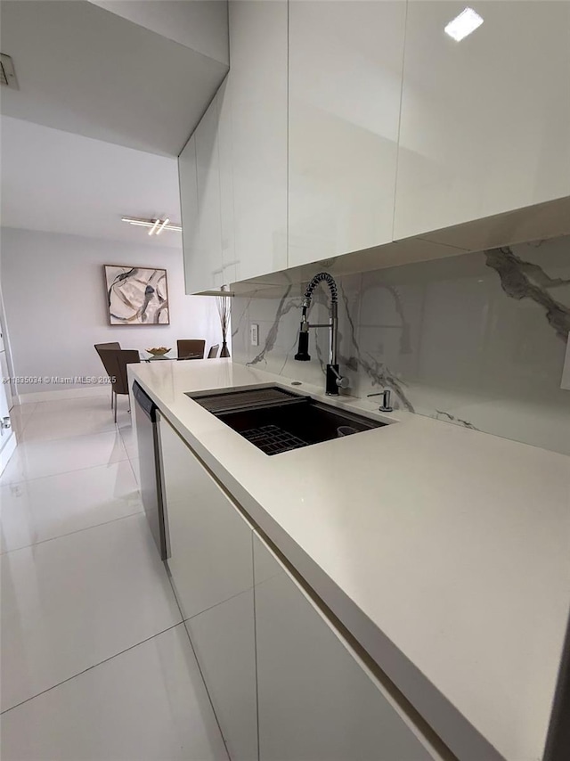 20379 W Country Club Dr Unit 1434, Aventura, FL 33180 - kitchen with white cabinetry, modern cabinets, light countertops, and dishwasher