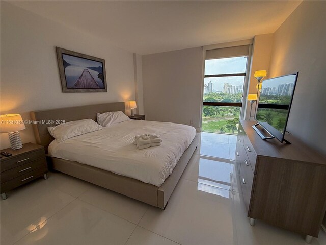 20379 W Country Club Dr Unit 1434, Aventura, FL 33180 - bedroom with light tile patterned floors