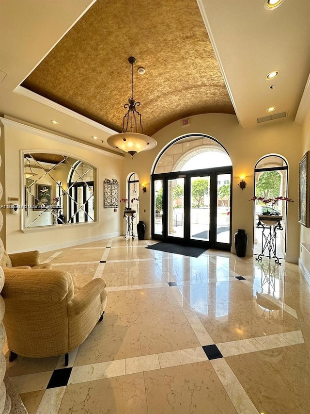 616 Clearwater Park Rd Unit 703, West Palm Beach, FL 33401 - building lobby with recessed lighting and ornamental molding