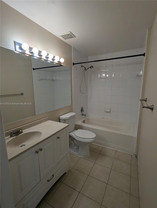 616 Clearwater Park Rd Unit 703, West Palm Beach, FL 33401 - bathroom with tile patterned floors, vanity, and shower / bathtub combination