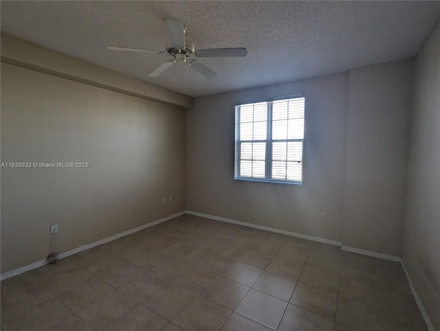 616 Clearwater Park Rd Unit 703, West Palm Beach, FL 33401 - unfurnished room featuring a textured ceiling, ceiling fan, and light tile patterned flooring
