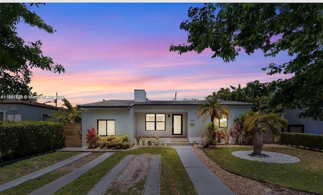 2485 SW 19th Ter, Miami, FL 33145 - ranch-style house featuring a chimney and stucco siding